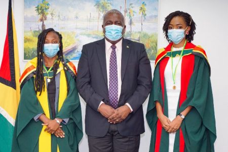 Best graduating medicine and social science students receive Prime Minister’s Medal: Prime Minister Mark Phillips on Friday conferred the Prime Minister’s Medal to two University of Guyana graduates for outstanding performances in Medicine and Social Sciences.  According to the Department of Public Information (DPI), the recipients were the best graduating student in the School of Medicine, Dr Jonelle Europe, and the best graduating student in the Faculty of Social Science with a Degree in Public Management, Desiree Noble. At a ceremony at his office on Friday, Phillips congratulated the pair for their commitment and exceptional performance in spite of the challenges of the COVID-19 pandemic. UG on Friday held the first of five convocation ceremonies for its 2019/2020 graduating class. From left are Noble, Phillips and Europe. (DPI photo)
