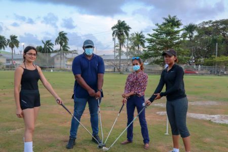 Some of the competitors of the Assuria inaugural three-hole golf tournament. The event has been extended to March 20.
