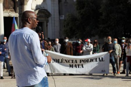 FILE PHOTO: Prominent anti-racism activist Mamadou Ba speaks during a protest in Lisbon