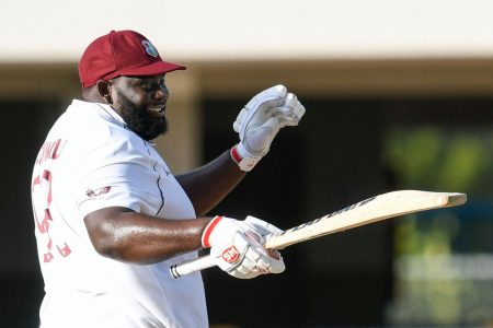 All-rounder Rahkeem Cornwall yesterday created history by becoming the first Antiguan to score a test half century at the Sir Vivian Richards Stadium cricket ground yesterday.
The burly batsman played an audacious innings of 60 not out from 79 balls with nine fours and two sixes, adding 90 invaluable runs for the eighth wicket with wicketkeeper Joshua Da Silva who made 46.
Cornwall is still there and will resume today’s third day looking for three figures and at the same time extending the West Indies’ 99-run lead into something more substantial.
