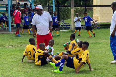 FLASHBACK! The late Neil `Grizzly’ Humphrey during a coaching stint with youth from his community. (Photo courtesy Joseph Simon)