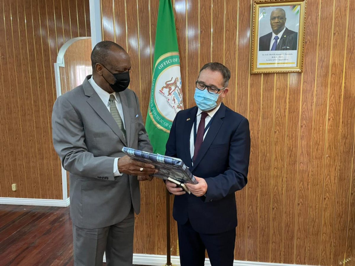 Leader of the Opposition Joseph Harmon (left)   with newly appointed Canadian High Commissioner Mark Berman.