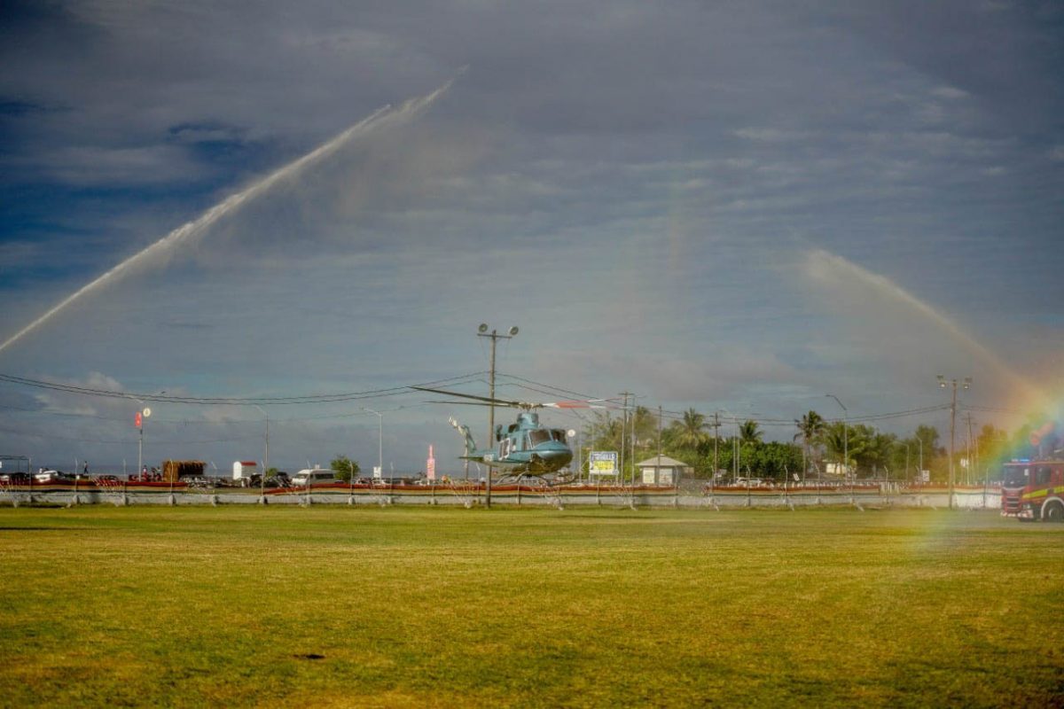 The army’s new Bell 412 EPI helicopter receiving a ceremonial water cannon salute from the Guyana Fire Service after landing at the Base Camp Ayanganna yesterday afternoon. (Office of the President photo)