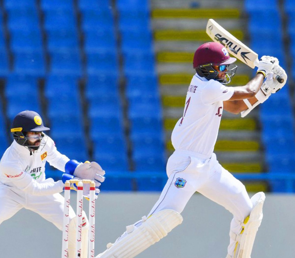 Captain Kraigg Brathwaite plays a shot  en-route to his unbeaten 99 on day one of the second Test yesterday. 