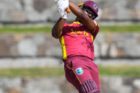 Opener Evin Lewis goes on the attack during his fifth ODI hundred against Sri Lanka yesterday. (Photo courtesy CWI Media/Philip Spooner) 