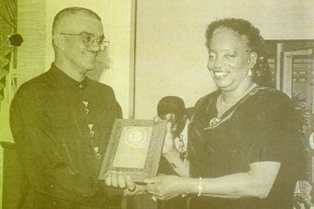 FLASHBACK! The late Michael Da Silva seen receiving his Guyana Olympic Association Journalist of the Year award from former Chief Justice Desiree Bernard.