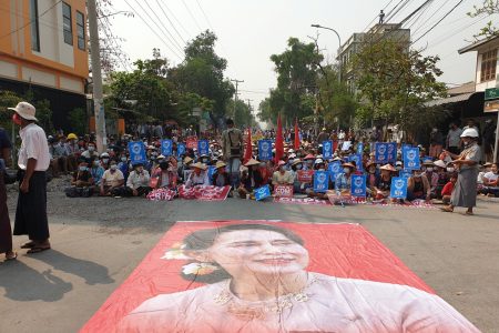 People take part in a sit-in protest in Mandalay, Myanmar March 10, 2021, in this picture obtained by Reuters from social media.   