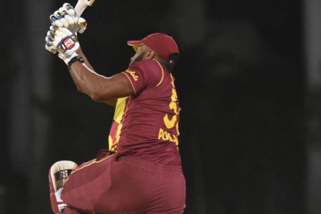 West Indies T20 skipper Kieron Pollard hits one of his six sixes against Sri Lanka’s Akila Dananjaya