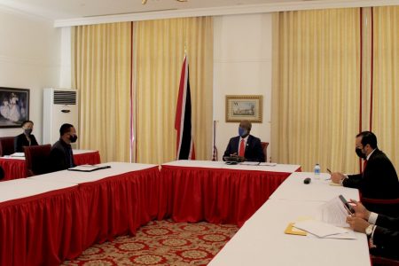 Minister of Health Terrence Deyalsingh, left, Minister of Foreign and Caricom Affairs Dr Amery Browne, Prime Minister Dr Keith Rowley, Minister of National Security Stuart Young and Permanent Secretary to the Prime Minister Maurice Suite listen to the call between PM Rowley and China President Xi Jinping via teleconference at the Diplomatic Centre, St Ann’s, yesterday. (OFFICE OF THE PRESIDENT)