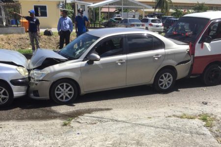 Sandwiched: A three-vehicle sandwich yesterday morning  near the Camp and Lamaha Sts junction.