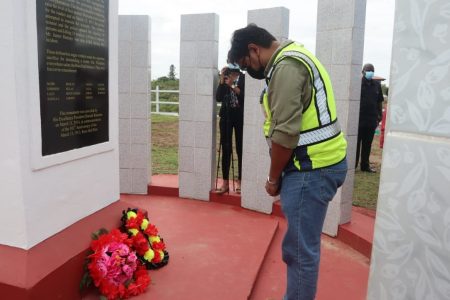 Sasenarine Singh, CEO  of GuySuCo laying a wreath at the Rose Hall Martyrs Memorial 