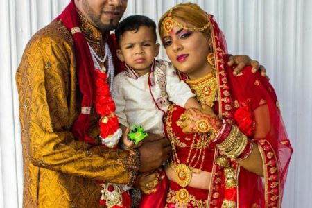Anesah with husband Ryan and their son Vihaan at their wedding