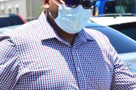 Eddie Doolal leaving the Georgetown Magistrate’s Court yesterday 