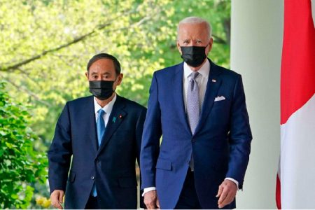 President Joe Biden (right) with Japanese Prime Minister Yoshihide Suga yesterday