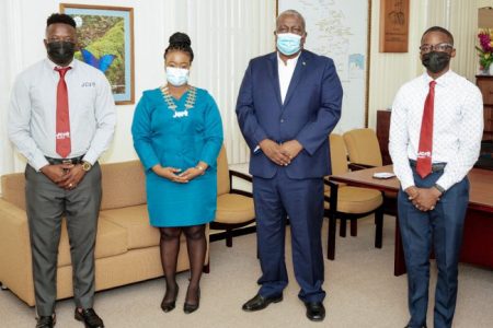 Prime Minister Mark Phillips with (from left) JCI Senator/Advisor Kevin Cornette, JCI Guyana President Kestine King, and JCI Vice President of Projects and Community Development Deshawn Walcott. (DPI photo)
