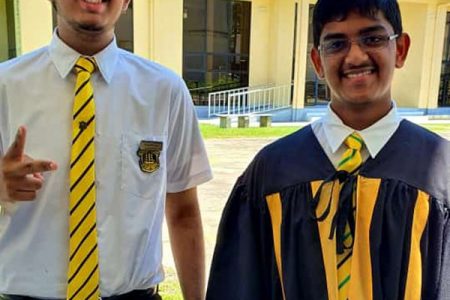 Zane Ramotar and Bhedesh Persaud, who topped for Guyana at the CAPE and CSEC examinations, respectively
