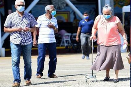 Halfway there: A group of people leave the Grand Stand, Queen’s Park Savannah, Port of Spain, last Sunday after receiving their first dose of the AstraZeneca Covid-19 vaccine.  (Trinidad Express photo)