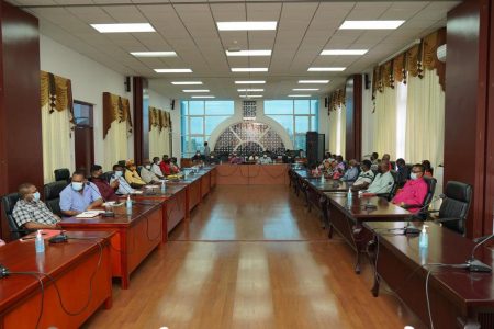 The representatives of GAWU and GuySuCo at the meeting (Department of Public Information photo) 