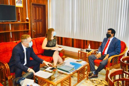 Attorney General Anil Nandlall SC (right) with Canadian High Commissioner Mark Kevin Berman. (left) and Counsellor, Development Cooperation,  Janine Cocker  (Ministry of Legal Affairs photo)