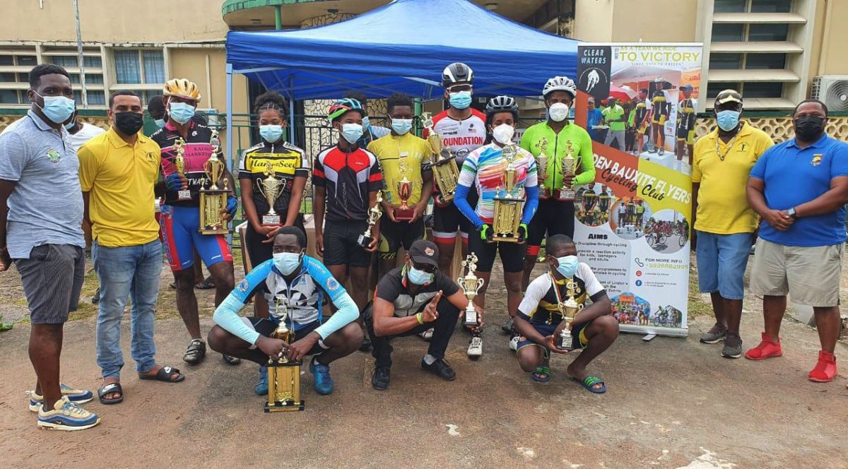 The winners of the Linden Town Week cycling classic pose with their prizes.