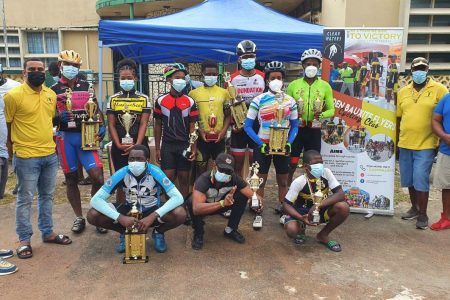 The winners of the Linden Town Week cycling classic pose with their prizes.
