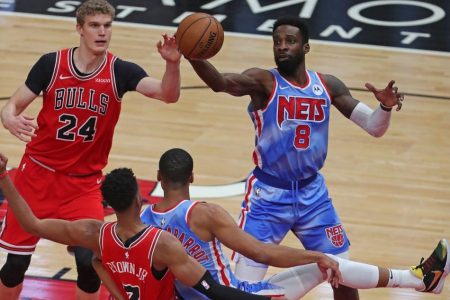 Chicago Bulls forward Lauri Markkanen (24) and Brooklyn Nets forward Jeff Green (8) fight for a rebound during the second quarter at the United Center. Mandatory Credit: Dennis Wierzbicki-USA TODAY.
