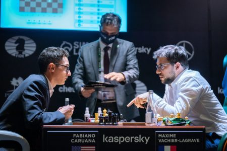  American Fabiano Caruana (left) following his enormous victory over France’s Maxime Vachier-Lagrave in the World Championship Candidates Tournament on Monday. The endgame favoured Caruana. (Photo: Lennart Ootes)  