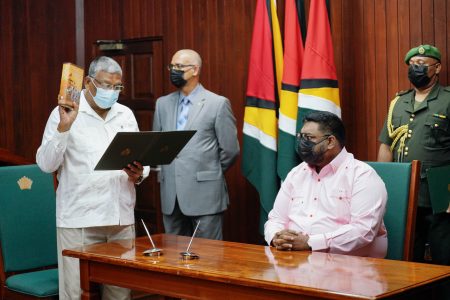 Dr Nanda Kishore Gopaul taking the oath before President Irfaan Ali (Office of the President photo)
