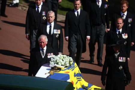 The hearse, a specially modified Land Rover, and the Royal Family walk near St George’s Chapel during the funeral of Britain’s Prince Philip, husband of Queen Elizabeth, who died at the age of 99, on the grounds of Windsor Castle in Windsor, Britain, April 17, 2021. (Reuters)
