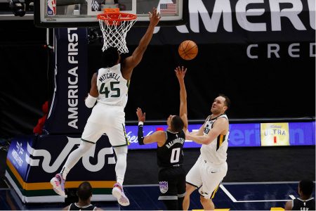 Utah Jazz guard Donovan Mitchell (45) goes for the block on Sacramento Kings guard Tyrese Haliburton (0) in the second quarter at Vivint Smart Home Arena. Mandatory Credit: Jeffrey Swinger-USA TODAY.
