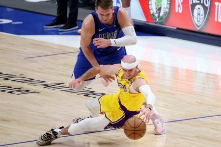  Luka Doncic finished with 30 points, nine rebounds and eight assists to lead the Dallas Mavericks to a 115-110 victory at against the visiting Los Angeles Lakers on Thursday night.