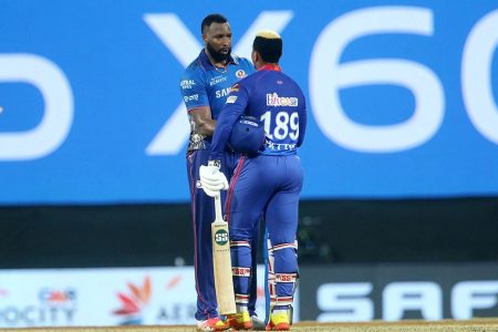 WELL PLAYED! Kieron Pollard of Mumbai Indians shake hands with Shimron Hetmyer of Delhi Capitals during yesterday’s match of the Vivo Indian Premier League 2021 at the M. A. Chidambaram Stadium, Chennai. Photo by Vipin Pawar / Sportzpics for IPL