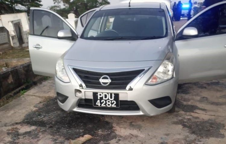 The rented vehicle the body was found in. (Trinidad Express photo)