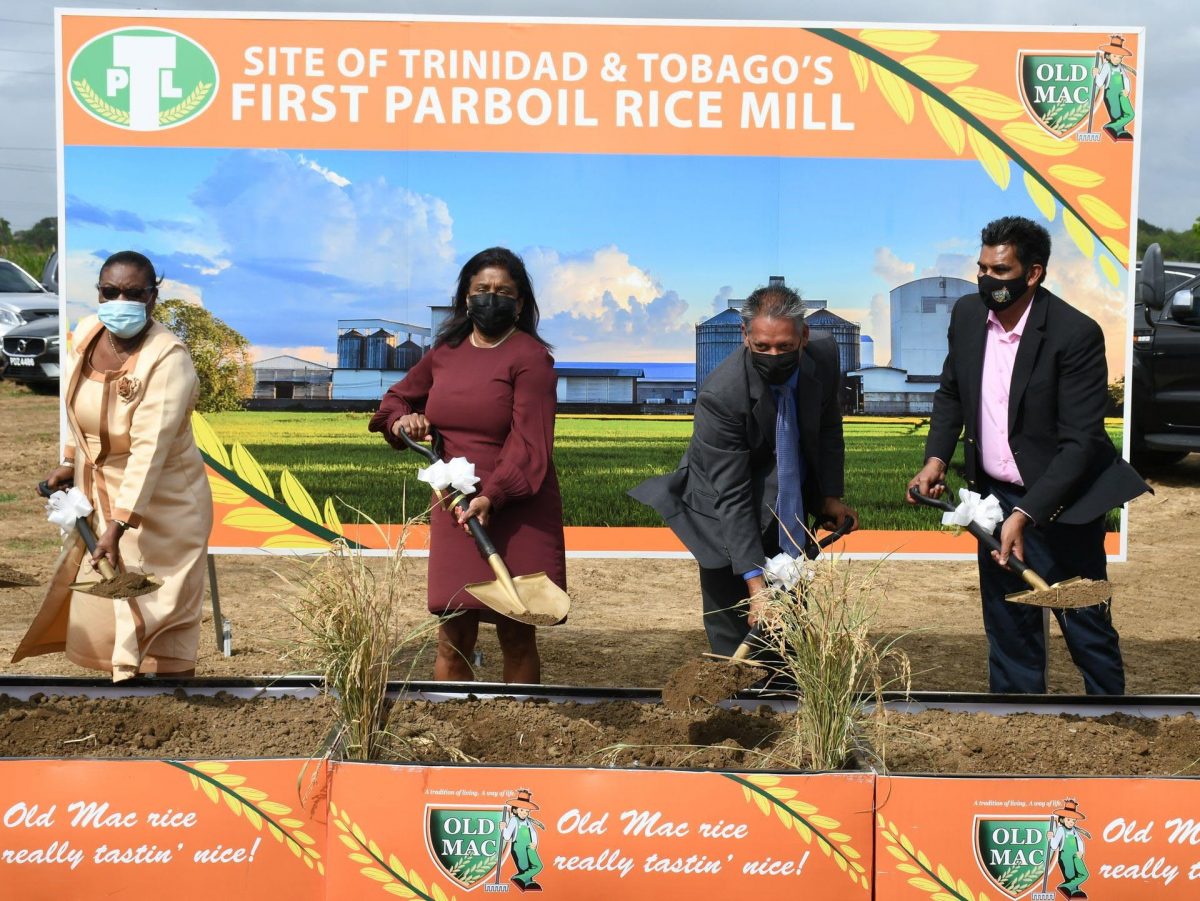 From left: Rice farmers representative Therese Akaloo,  Trade Minister Paula Gopee-Scoon, Agriculture Minister Clarence Rambharat and CEO of TPL Liaquat Ali turning the sod  at Milton, Couva.