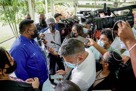 President Irfaan Ali (left) speaking to reporters at State House on Wednesday (Office of the President photo)