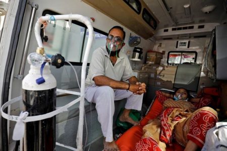 Patients with a breathing problem wait inside an ambulance to enter a COVID-19 hospital for treatment, amidst the spread of the coronavirus disease (COVID-19) in Ahmedabad, India, April 19, 2021. REUTERS/Amit Dave