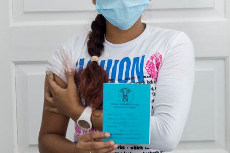 A young adult after her vaccination (Ministry of Health photo)