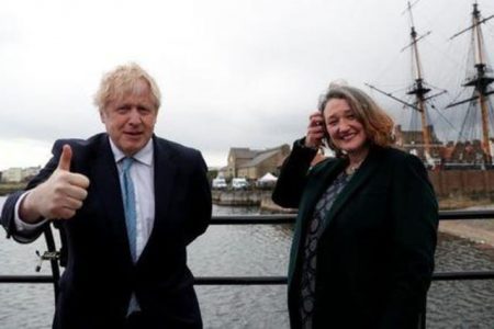 Britain's Prime Minister Boris Johnson and newly elected MP for Hartlepool Jill Mortimer pose for a photo at Jacksons Wharf Marina in Hartlepool following local elections, Britain, May 7, 2021. REUTERS/Lee Smith