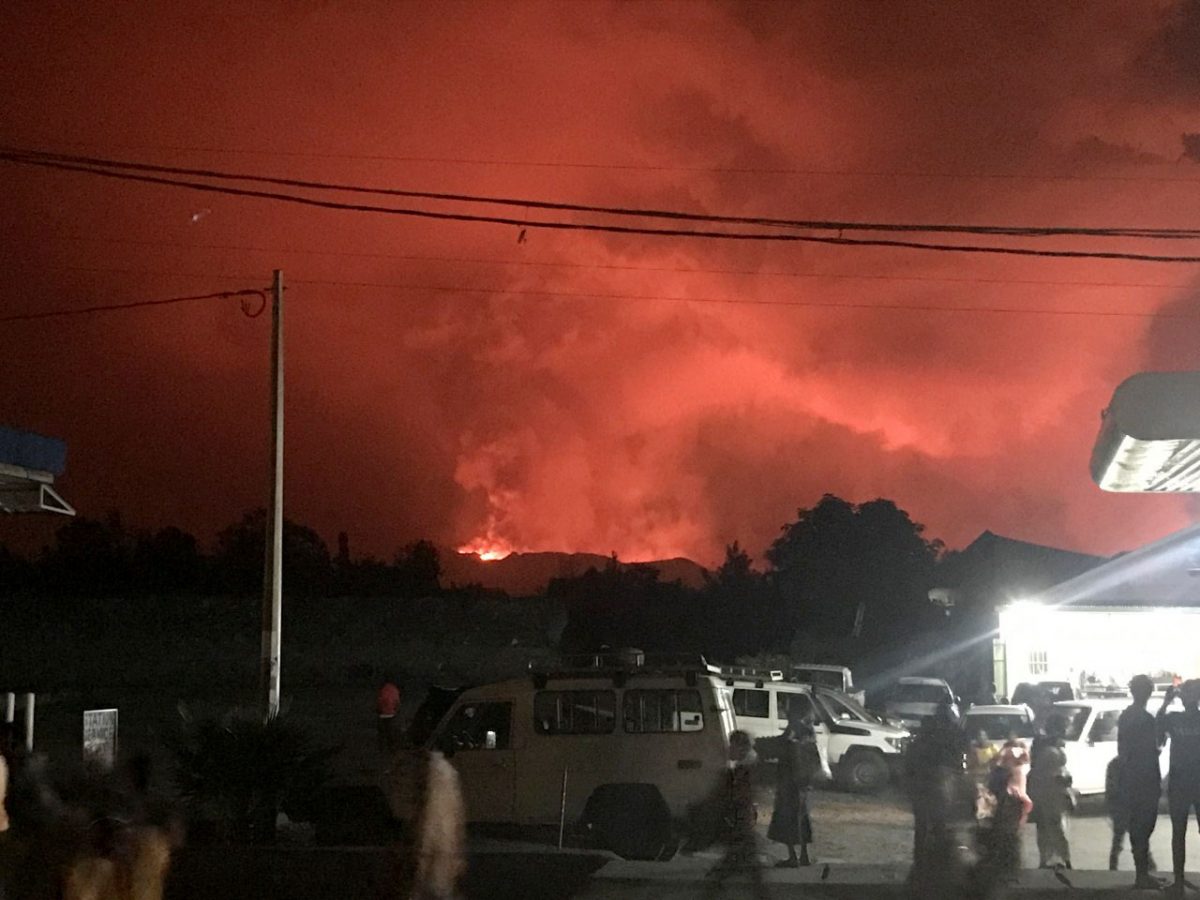 Civilians watching the smoke and flames (Reuters photo)