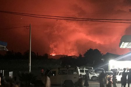 Civilians watching the smoke and flames (Reuters photo)