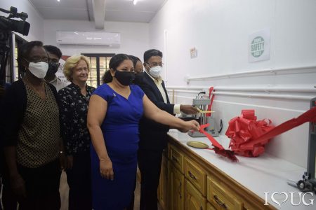 Vice Chancellor of the University of Guyana Paloma Mohammed (centre) and Halliburton, Country Lead Vahman Jurai cutting the ribbon at the launch of the Faculty of Engineering and Technology’s drilling fluids lab. Also in the photo are faculty Dean, Verlyn Klass and Head of the Mechanical Engineering Department, Elena Trim.