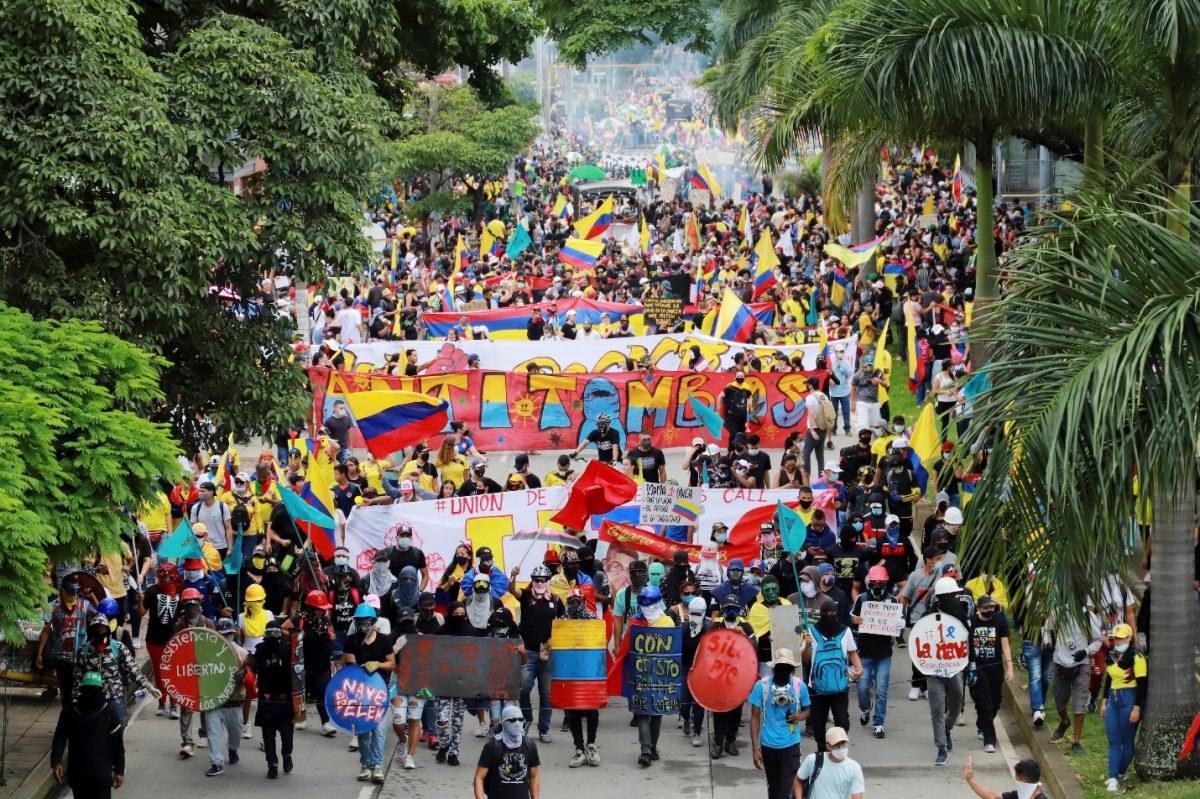 People take part in a protest demanding government action to tackle poverty, police violence and inequalities in healthcare and education systems, in Cali, Colombia May 28, 2021. REUTERS/Juan B Diaz