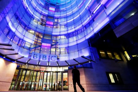 FILE PHOTO: A man enters BBC New Broadcasting House in London November 11, 2012. REUTERS/Luke MacGregor