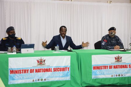 National Security Minister Fitzgerald Hinds (centre) speaks to members of the media during a press conference at the National Security Ministry Abercromby Street, Port-of-Spain, on Sunday. Looking left is Chief of Defense Staff Air Commodore Darryl Daniel and Commissioner of Police Gary Griffith right.
