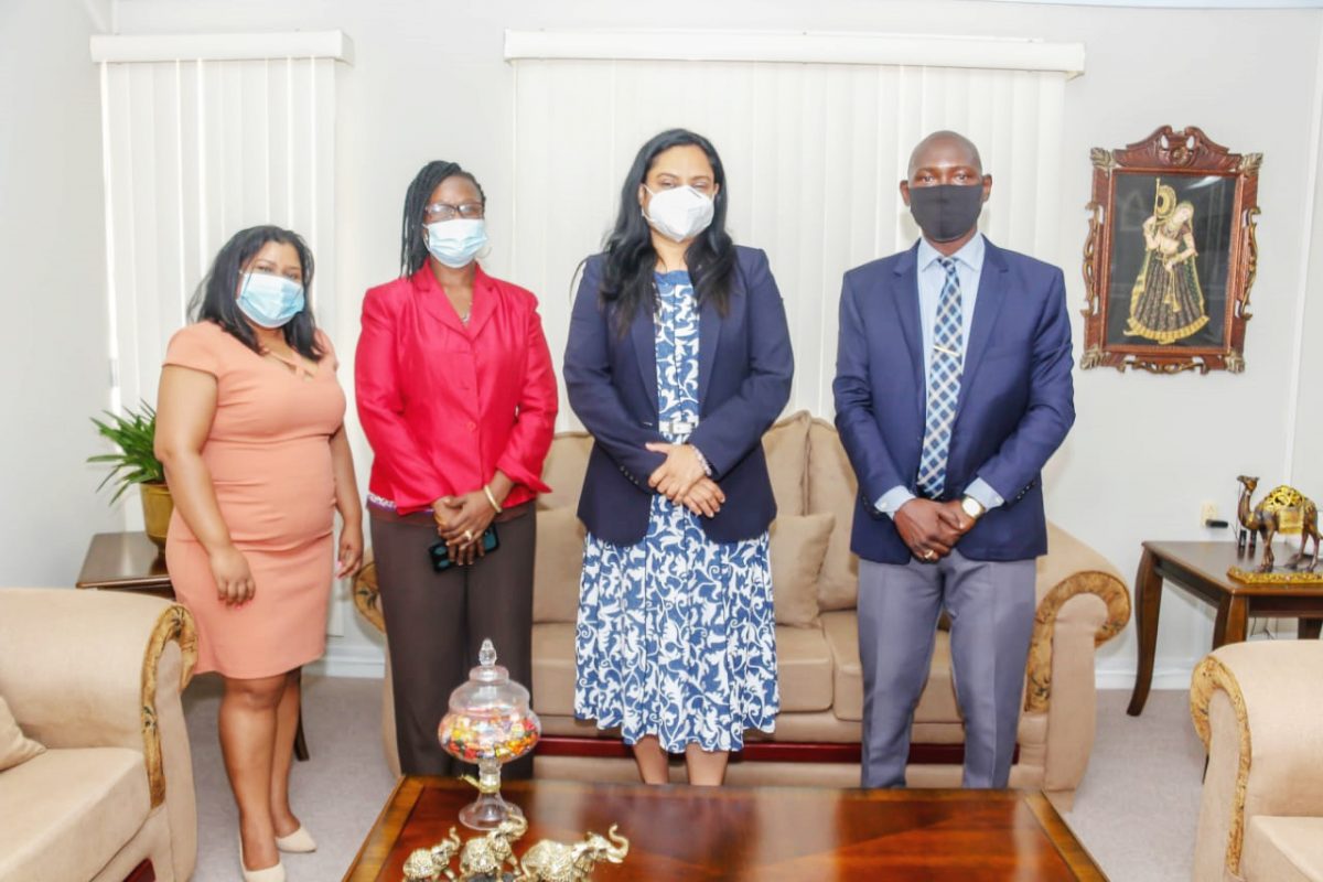 Minister Vindhya Persaud (second from right) and Permanent Secretary Anjanie Ramlall (left) with UG Sociologists Debbie Hopkinson (second from left) and Andrew Hicks.