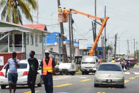 Street lights being installed yesterday on the recently rehabilitated Hunter Street, West Ruimveldt.