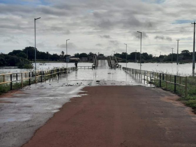 A section of a main bridge in Lethem partially covered by water overflowing from the river (CDC photo)