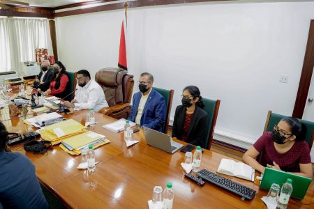 President Irfaan Ali (fourth from right) and others at the session.