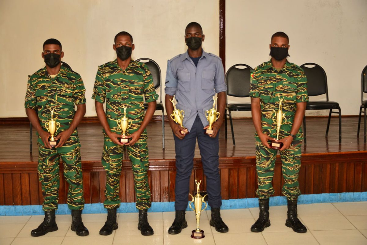 Some of the outstanding performers and their trophies (GDF photo)