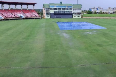 COVERED UP! Rain fell consistently yesterday forcing the first Guyana Cricket Board U19 Franchise match between General Marine Eagles and Tropical Spring Falcons to be abandoned.